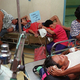 Friends and family comfort potential victims of the death epidemic in Manila.